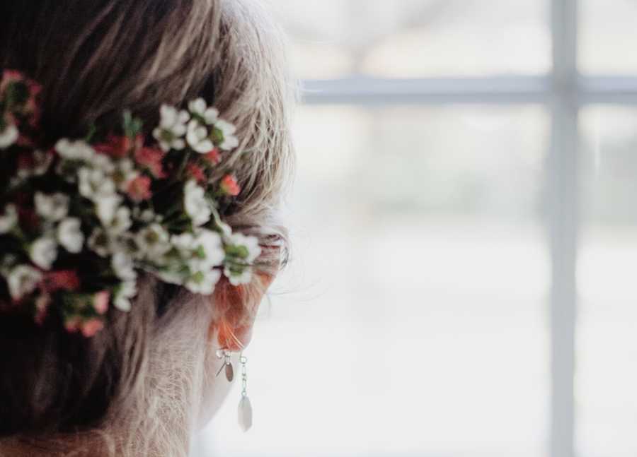 flowers in hair of the bride